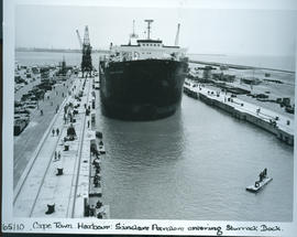 "Cape Town, 1956. 'Sinclair Petrolore' entering Sturrock dock in Table Bay harbour."