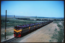 Germiston district, circa 1971. Four SAR Class 6E1 Srs 3's headed by No E1300 hauling a train of ...