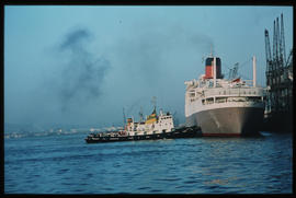 Durban, 1970. SAR tug 'Danie du Plessis' with 'Windsor Castle' in Durban Harbour.