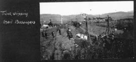 Estcourt, July 1925. Trans-shipping of passengers on mail train due to derailment at road bridge....
