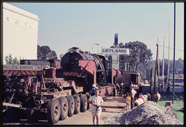 Loading of steam locomotive from SAR low bed trailer No MT23003 at Leyland workshop.