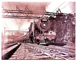 Johannesburg, 1949. SAR Class 15F 'Princess Elizabeth' with Blue Train leaving Park Station.