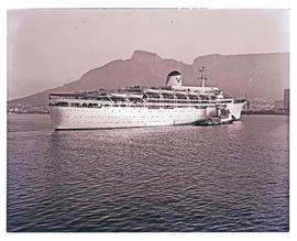 Cape Town, 1967. The 'Fair Star' with tug  in Table Bay.