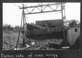 Estcourt, July 1925. Derailment at road bridge on July 14 involving 10 coal trucks with five of e...