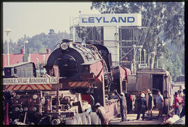 Loading of steam locomotive from SAR low bed trailer No MT23003 at Leyland workshop.