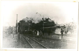 Durban, August 1901. Crowd looking on as decorated NGR Dubs 'A' leaves Durban station, bound for ...