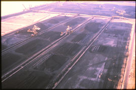 Richards Bay, 1984. Coal stockpiles in Richards Bay Harbour.