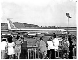 Durban, 1973. Louis Botha airport. Boeing 707 ZS-SAA 'Johannesburg'. Crowd leaning over railing l...