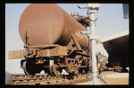 Bapsfontein, December 1982. SAR type XQ tanker wagon on the hump at Sentrarand marshalling yard. ...