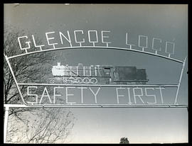 Glencoe. Entrance sign 'Glencoe Loco - Safety First'.