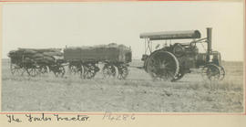 Fowler tractor with two trailers.