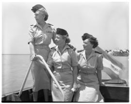 Vaal Dam, November 1949. BOAC Solent G-AHIX 'City of Edinburgh'. Three hostesses on passenger boat.