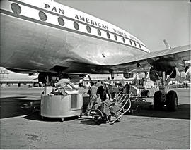 
Pan American Lockheed Constellation aircraft being loaded.
