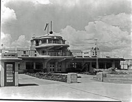 Johannesburg, 1935. Rand airport. Shot of control tower and buildings from apron, showing sign th...
