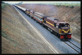 Komatipoort, 1986. SAR Class 37-000 No 37-052 with test train in long cutting.