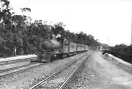 Cape Town, 3 April 1933. Local train from Cape Town to Paarl near Woltemade, hauled by SAR Class ...