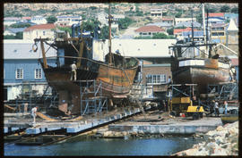 Mossel Bay, February 1987. Ship being repaired on ramp in Mossel Bay Harbour. [T Robberts]