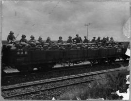 Johannesburg, 9 to 18 March 1922. Soldiers behind sandbags on SAR type D-8 drop-sided wagon.