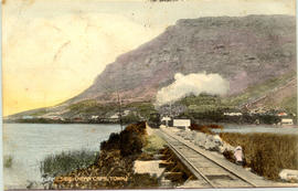 Cape Town. Train on railway bridge at Lakeside.