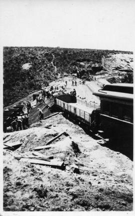 Construction train on embankment being repaired or constructed. (Lund collection)