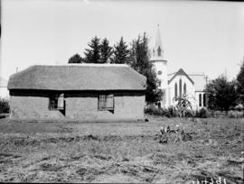 Lydenburg, 1937. Old Voortrekker church and new church.