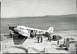 Johannesburg, 1935. Rand airport. SAA Junkers Ju-52 ZS-AFD 'Sir Benjamin d’ Urban', passenger dis...