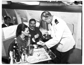 
SAA Boeing 707 interior. Steward. Drinks. See C6020.
