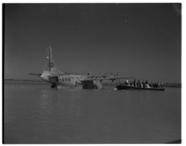 Vaal Dam, circa 1948. Arrival of BOAC Solent flying boat G-AHIN 'Southampton'. Aircraft with pass...