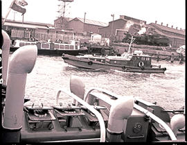 Durban, 1976. SAR Police patrol boat 'Vink' in Durban harbour with SAR Class S2 in background.