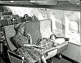 
SAA Boeing 707 ZS-CKC interior, boy sleeping.
