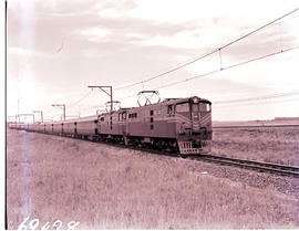 Johannesburg, 1961. Two SAR Class 5E Srs 2 with 2up Blue Train near Roodepoort. Note A-37 Wegmann...