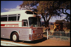 Potgietersrus district, 1976. SAR Silver Eagle tour bus No MT60013 at Moorddrift monument.
