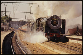 January 1991. SAR Class 25NC No 3407 'Pauline' with passenger train at '?mberg' railway station p...