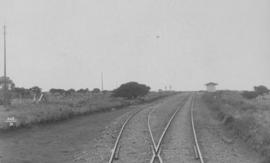 Egerton, 1895. Railway lines with small station building in the distance. (EH Short)