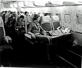 
SAA Boeing 707 interior, child sleeping.
