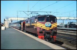 Potchefstroom, 1972. Trans-Karoo Express headed by SAR Class 6E arriving at railway station.
