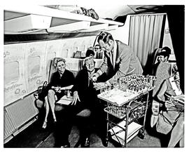 
SAA Boeing 707 interior. Cabin service. Steward.
