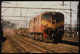 Germiston. Goods train headed by SAR Class 6E1 Srs 3 No E1439 at Driehoek.
