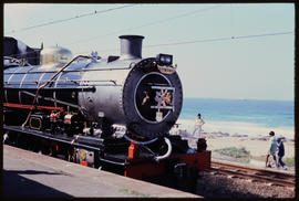 Natal South Coast, July 1976. SAR Class 14R No 1733 'Bayhead' with Durban Special at Kelso statio...