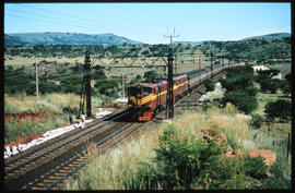 Colenso district, 1975. SAR Class 5E1 Srs 2 No E672 with passenger train.