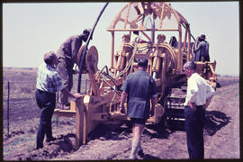 Cable laying machine at work. Caterpillar D7 crawler tractor.