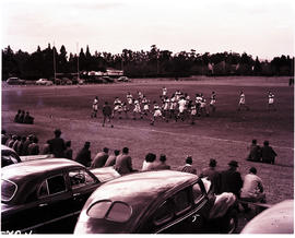 Rustenburg, 1950. Rugby game in progress with spectators looking on..