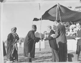 Salisbury, Southern Rhodesia, 7 April 1947. King George VI presenting an award.