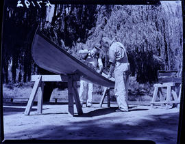 Kroonstad, 1940. Two men working on small boat.