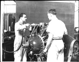 Johannesburg, circa 1949. Rand Airport. Working on aircraft radial engine in workshop. (JK Hora)