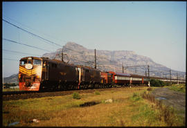 Cape Town, 1985. SAR Class 6E1 Srs 7 on 203down 'Trans Karoo' departing Cape Town.