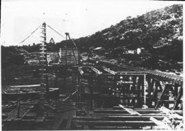 Humansdorp district, October 1910. Gamtoos River bridge: Driving screw piles on the north side an...