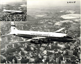 Johannesburg. SAA Douglas DC-7B ZS-DKE 'Reiger' in flight over city centre. See N67417.