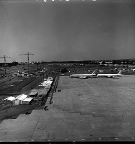 Johannesburg, circa 1979. Jan Smuts Airport. Aircraft at construction camp.