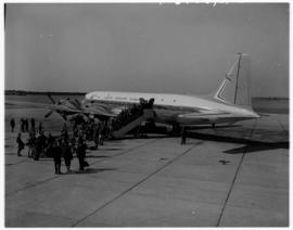 July 1963. Departure of Boy Scouts on chartertered SAA Douglas DC-7B ZS-DKG 'Chapman'.